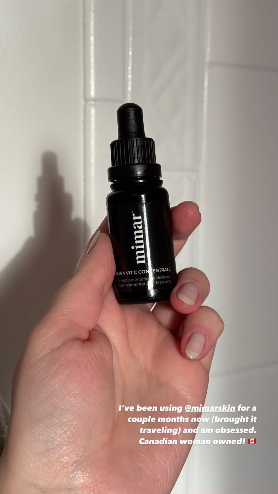 Hand holding Mimar Ultra Vit C Concentrate
