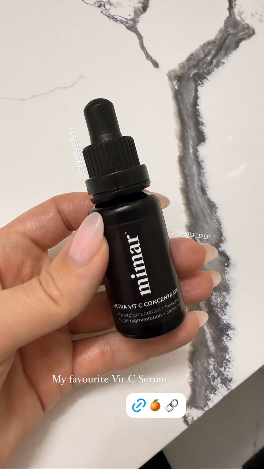 Hand holding Mimar Ultra Vit C Concentrate